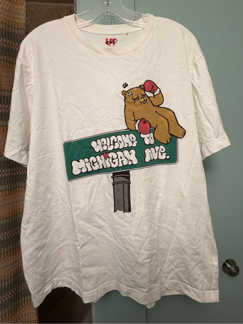 Uniqlo White Tee with Brown Bear and Green Street Sign Graphic